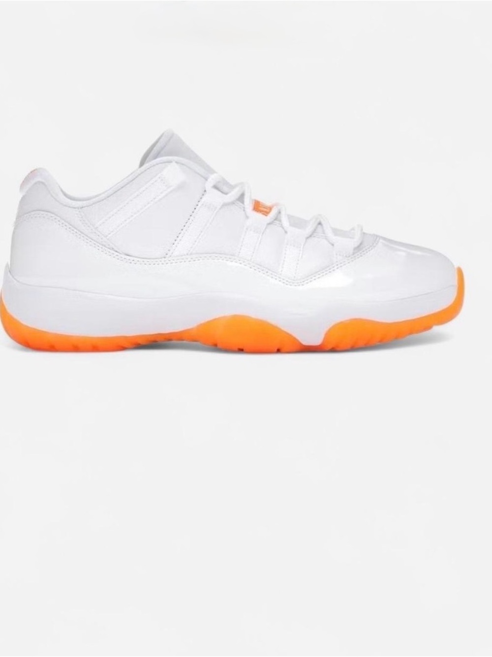 Jordan 11 Retro Low white & orange trainers
